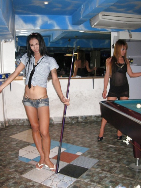 Gorgeous busty Asian tranny M bending over while playing pool 34565667